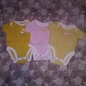 3 Nike Onesies